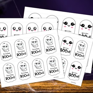 May include: Sheets of white Halloween-themed stickers featuring cartoon ghosts with various expressions. Each sticker has the text "You've been BOOed!" in black. The stickers measure 3.5 x 2 inches and 3.5 x 7 inches.