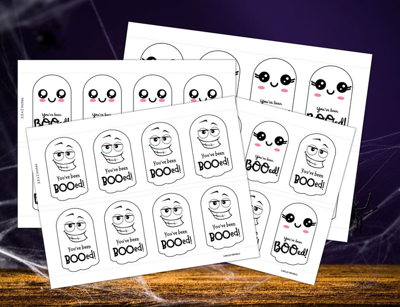 May include: Sheets of white Halloween-themed stickers featuring cartoon ghosts with various expressions. Each sticker has the text "You've been BOOed!" in black. The stickers measure 3.5 x 2 inches and 3.5 x 7 inches.