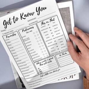 May include: A black and white printable worksheet with the title "Get to Know You". The worksheet includes sections for personal information, preferences, favorites, and a "This or That" section. It also includes a section for gift card ideas.