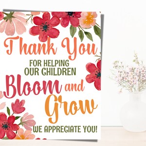 May include: Thank you for helping our children bloom and grow. We appreciate you!  A printable card with a floral design and a message of appreciation for teachers or staff.