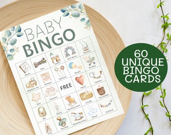 May include: A printable baby shower bingo card with 25 squares featuring illustrations of baby items such as a rattle, a rocking horse, a bib, a star, a castle, a bow, a heart, a pacifier, a sweater, a rocking chair, a stroller, a camera, a toy basket, a cloud, a garland, a dresser, a teether, a bunny, a tent, a book, a balloon, a cradle, a wall decor, and an elephant toy. The card has the words "BABY BINGO" at the top and "FREE" in the center square.