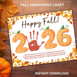 May include: A rectangular print featuring the text Happy Fall! and the year 2026, where the numbers are illustrated as orange pumpkins. A red handprint replaces the zero. The border is decorated with orange, yellow, and brown autumn leaves.