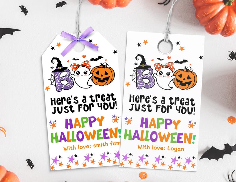 May include: Two Halloween gift tags with the word "BOO" spelled out with a witch hat, ghost, and jack-o'-lantern. The tags read "Here's a treat just for you!" and "Happy Halloween!" with a name at the bottom. A purple bow is at the top.