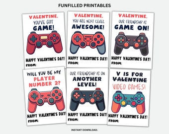 May include: Six printable Valentine's Day cards featuring a video game controller design. The cards have different messages, including "Valentine. You've got game!" and "V is for Valentine Video Games!"