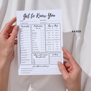 May include: A black and white printable "Get to Know You" questionnaire with sections for personal information, favorites, preferences, and "This or That" questions. The questionnaire is designed for getting to know someone better.