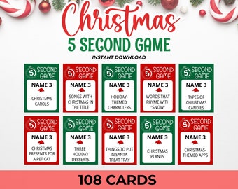 Könnte beinhalten: Ein Set mit 108 Weihnachts-Spielkarten mit rotem und grünem Hintergrund. Jede Karte hat ein 5-Sekunden-Timer-Symbol und die Worte "Second Game". Die Karten bieten verschiedene weihnachtliche Aufforderungen für ein lustiges Spiel.