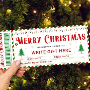 May include: A white Christmas gift voucher with red and green stripes. The voucher features a festive design with a Christmas tree, snowflakes, and fairy lights. The text on the voucher reads "Merry Christmas" and "This coupon is good for Write Gift Here". There are spaces to write the recipient's name, a message, and the gift.