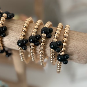 Black Mouse Bead on Gold Beaded Bracelet