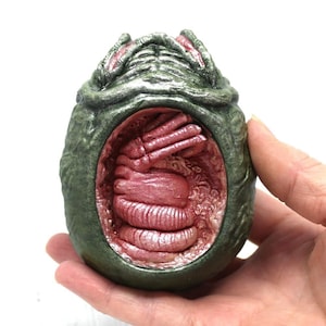 Cutaway Xenomorph Egg: Green and Red Alien Ovomorph with Facehugger