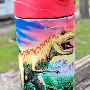 Kids 12oz flip top Dinosaur tumbler