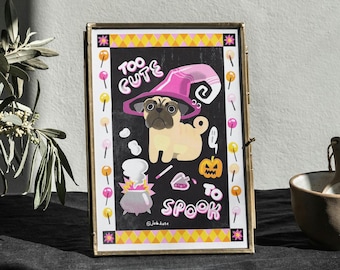 May include: A framed illustration of a pug wearing a pink witch hat and holding a wand. The text "Too Cute To Spook" is written in pink and yellow letters. The background is black with a yellow and pink checkered border.