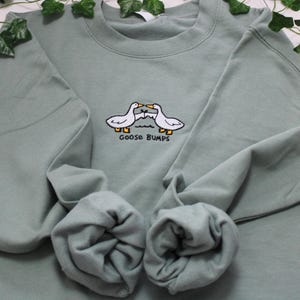 Faux Patchwork Goose Sweatshirt