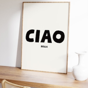 CIAO large in black and BELLA in a much smaller size directly underneath