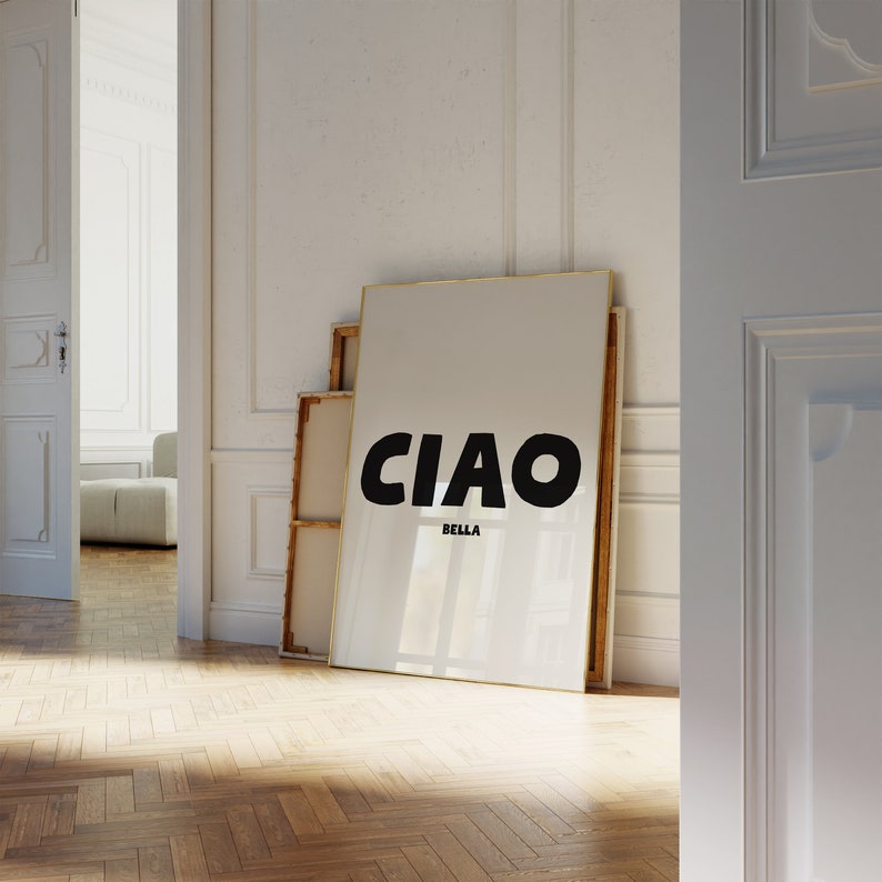CIAO large in black and BELLA in a much smaller size directly underneath