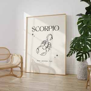 Pode incluir: Uma ilustra&ccedil;&atilde;o em preto e branco de um escorpi&atilde;o com a palavra "SCORPIO" em texto preto acima. As palavras "corajoso - apaixonado - leal" est&atilde;o escritas em texto preto abaixo do escorpi&atilde;o.