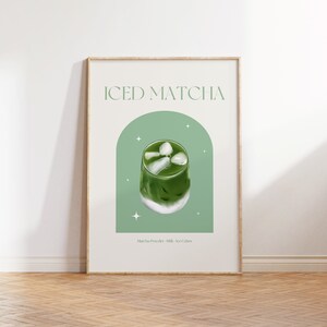 Print mockup of - Iced matcha written at the top in green, green arch with white stars and photo of Iced Matcha on top. Matcha Powder • Milk • Ice Cubes written underneath.