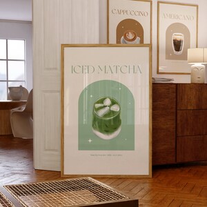Print mockup of - Iced matcha written at the top in green, green arch with white stars and photo of Iced Matcha on top. Matcha Powder • Milk • Ice Cubes written underneath.