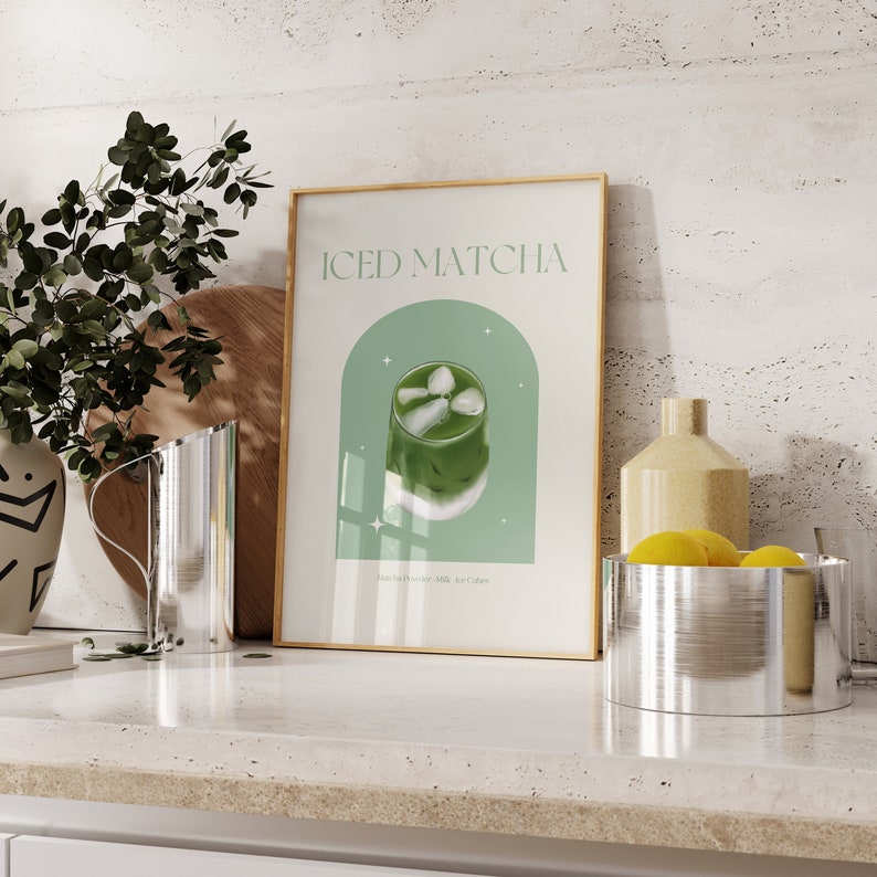 Print mockup of - Iced matcha written at the top in green, green arch with white stars and photo of Iced Matcha on top. Matcha Powder • Milk • Ice Cubes written underneath.