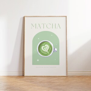 Print mockup of - Matcha written at the top in green, green arch with white stars and photo of Matcha on top. Matcha Powder • Hot Water • Steamed Milk written underneath.