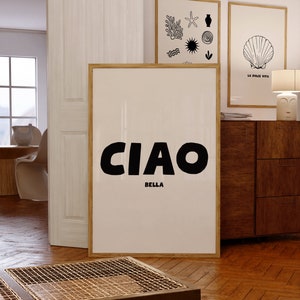 CIAO large in black and BELLA in a much smaller size directly underneath