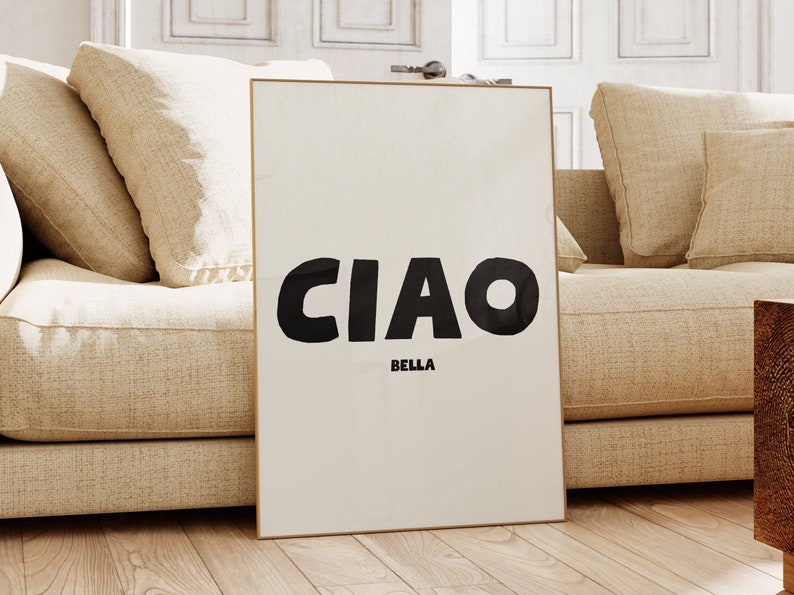CIAO large in black and BELLA in a much smaller size directly underneath