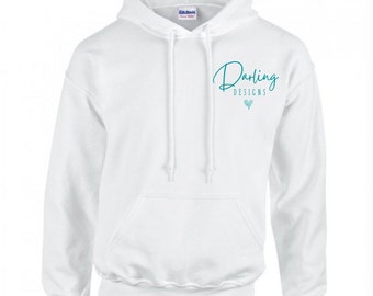 May include: White hooded sweatshirt with a front pocket and drawstring. The teal text "Darling Designs" and a teal heart graphic are on the upper chest. The Gildan brand label is visible on the hood.