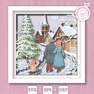 Könnte beinhalten: 3D-Papierkunstszene eines Winterdorfes mit einer Familie. Ein Paar geht einen verschneiten Weg entlang, während ein Kind schlittenfährt. Das Kunstwerk zeigt eine Kirche, Häuser und schneebedeckte Bäume, alles in einem weißen Rahmen.