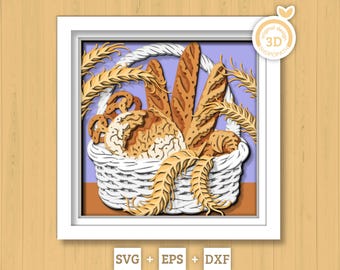 May include: A framed 3D paper art piece featuring a white basket overflowing with various baked goods, including bread loaves and pretzels. Wheat stalks frame the basket, and the background is a soft purple. The artwork is labeled "original design 3D SHOPOPATH".