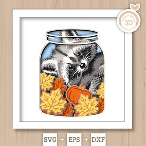 May include: A layered paper craft design featuring a gray and white raccoon inside a glass jar filled with orange pumpkins and yellow and orange autumn leaves. The design includes a circular badge in the corner with the text 3D SHOPOPATH.