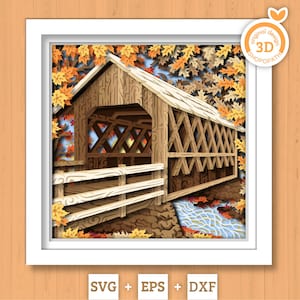 May include: A 3D paper art piece depicting a covered bridge in an autumn scene. The bridge is made of wood, with a white roof and a railing. The scene includes a stream, fall foliage, and the text "original design 3D SHOPOPATH".