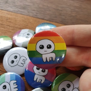 Tbh autism creature pride pins!