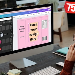 May include: A computer screen displaying a pink and yellow design template for a food product label. The template includes text that says "Place Your Design Here!" and "Place Design here". The screen is showing a design program with tools for creating and editing graphics.