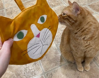 Oranje Grumpy Cat pannenlap