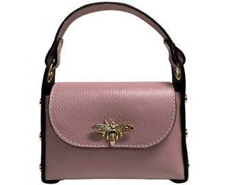 Genuine dollar leather mini bag with bee-shaped snap hook closure, side studs, removable metal chain, leather handle.