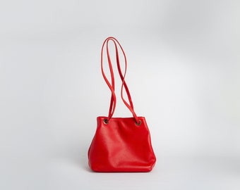 Bolsa tipo balde feita à mão em couro bovino, bolsa de viagem minimalista.