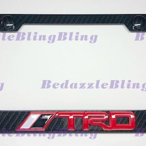 3D TRD Emblem On Carbon Fiber Style License Plate Frame W/ Carbon Fiber Style Bolt Caps