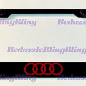 Audi op roestvrijstalen nummerplaatframe met boutdoppen