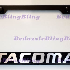 Tacoma On Stainless Steel License Plate Frame W/ Bolt Caps