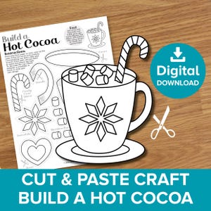 May include: A black and white cut-and-paste craft sheet for building a hot cocoa cup. The design includes a mug with marshmallows, a candy cane, and snowflake and heart decorations. The text "Build a Hot Cocoa" is visible.