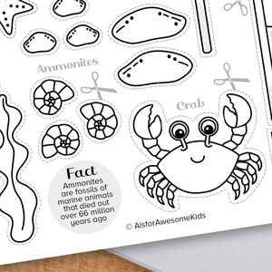 May include: Black and white printable craft activity featuring a crab, ammonites, and a starfish. The printable includes a fact about ammonites, stating that they are fossils of marine animals that died out over 66 million years ago. The text "AisforAwesomeKids" is at the bottom of the page.
