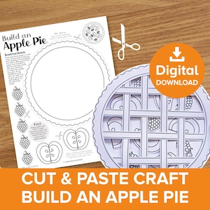 Puede incluir: Un kit de manualidades en blanco y negro para cortar y pegar para construir una tarta de manzana. El kit incluye instrucciones, corteza de tarta, rodajas de manzana y decoraciones de bayas.