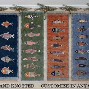 May include: Six rectangular hand-knotted rugs in yellow, dark blue, green, orange, light blue, and purple, each featuring a vertical column of stylized fish patterns. The text "HAND KNOTTED CUSTOMIZE IN ANY SIZE" is printed at the bottom.