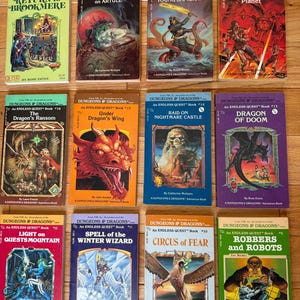 May include: A collection of vintage "Dungeons & Dragons" Endless Quest adventure books. The covers feature colorful illustrations of fantasy scenes, including dragons, wizards, and samurai. Titles include "Return to Brookmere" and "Dragon of Doom."