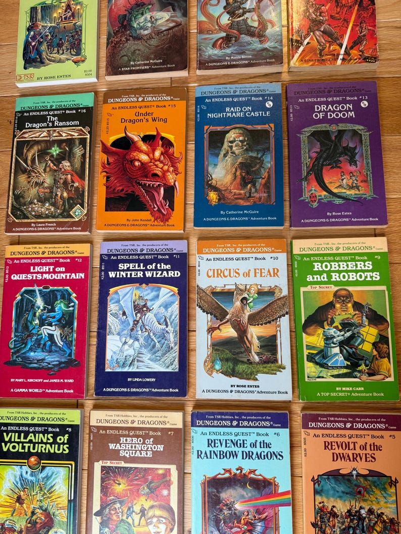 May include: A collection of vintage "Dungeons & Dragons" adventure books. The covers feature fantasy illustrations of dragons, wizards, and other mythical creatures. Titles include "The Dragon's Ransom," "Under Dragon's Wing," and "Dragon of Doom."
