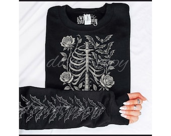 Sudadera Wild Harmony Apparel negra con estampado de esqueleto, costillas, rosas y murciélagos, talla 2X