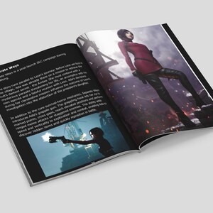 Peut inclure: Un livre ouvert avec une couverture noire et des pages blanches. La page de gauche porte le titre "Separate Ways" et la page de droite pr&eacute;sente une femme en tenue rouge. Une petite image sur la page de gauche montre une femme tenant une arme.