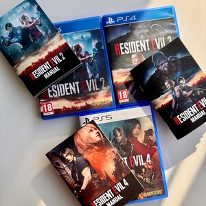 Peut inclure: Plusieurs bo&icirc;tiers et manuels de jeux vid&eacute;o sont pr&eacute;sent&eacute;s. Les bo&icirc;tiers bleus affichent les titres "Resident Evil 2" et "Resident Evil 4". Les manuels sont noirs et rouges, avec les titres des jeux et le chiffre "18" visibles.