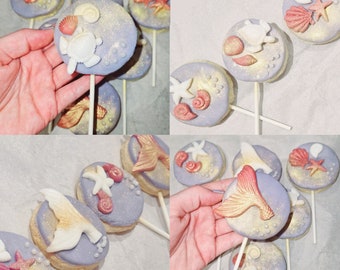 Sucettes sablées à thème