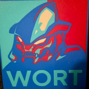 Könnte beinhalten: Rechteckiges Schild mit einer stilisierten Illustration eines Kreaturenkopfes in Blau, Rot und Creme. Das Wort "WORT" ist unten in Türkis aufgedruckt. Das Design erinnert an ein politisches Plakat mit kräftigen Farben.