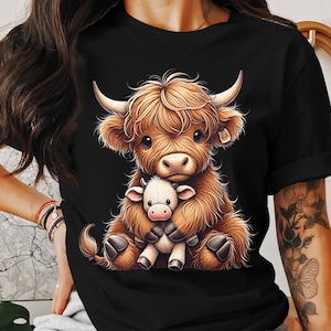 Highland Cow T-Shirt, Cute Calf with Toy, Scottish Cow Tee, Unique Animal Design Shirt, Trendy Graphic Tee, Gifts for Cow Lovers